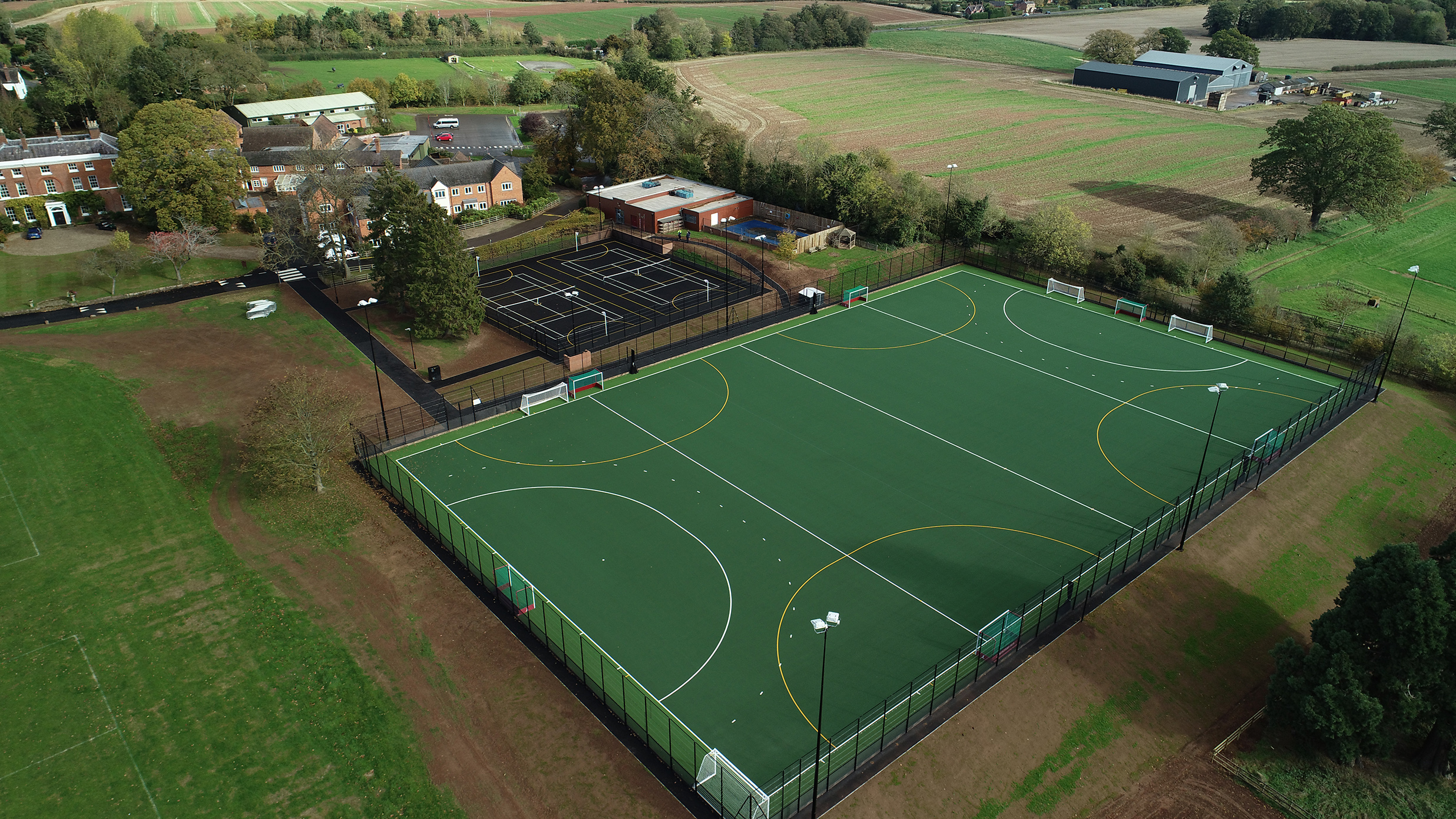 ...of a full size sand dressed synthetic grass hockey pitch with a spectato...